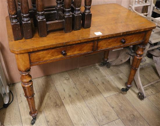 A Victorian mahogany side table, fitted two drawers on turned supports, W.3ft 4in.